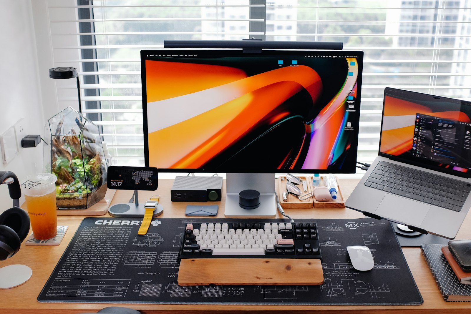 A sleek modern desk setup with multiple monitor screens